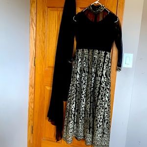 2 piece Pakistani suit. Comes with dupatta and a gown